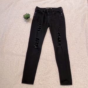 Express distressed black skinny jeans